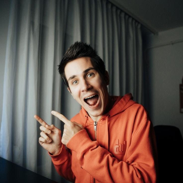 Alex Parker, Lead Design Curator at PixelAnchorPro, reviewing corporate floral arrangements